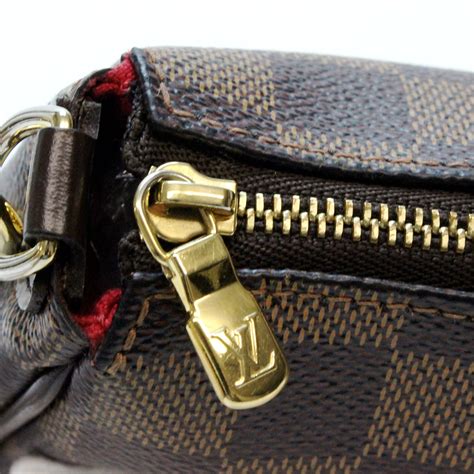 lv damier ebene eva clutch|louis vuitton eva clutch size.